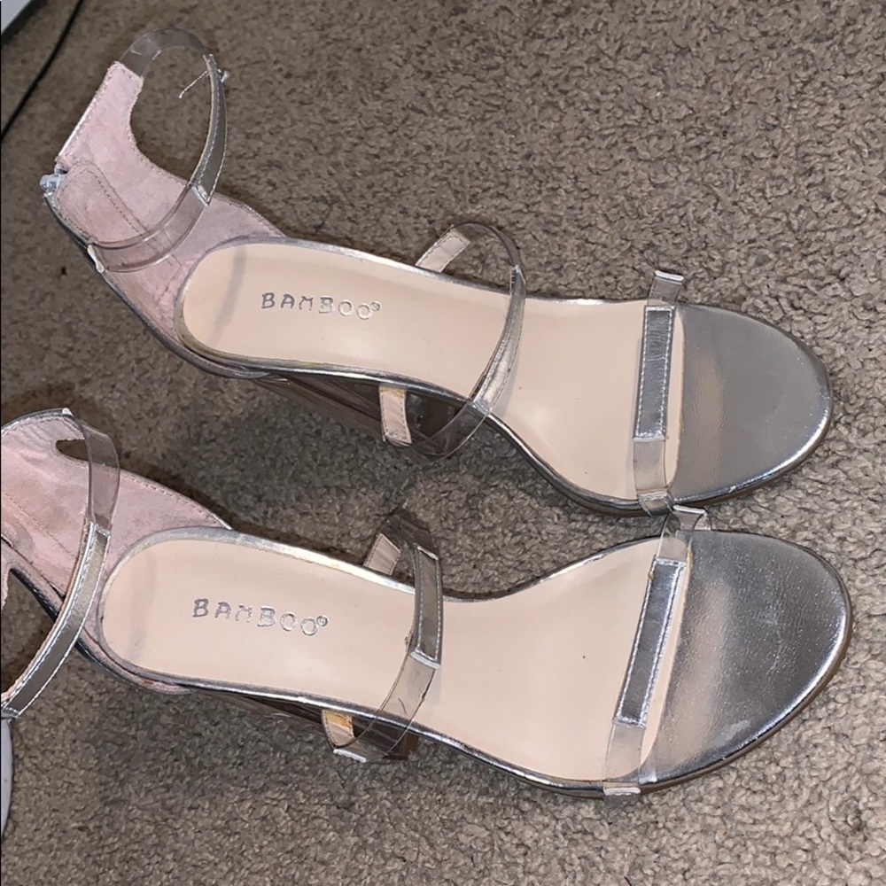 Clear and silver high heels